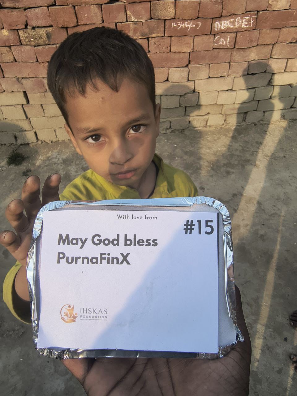 Child holding food tray, May God bless PurnaFinX #15